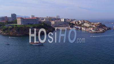 Sailboat Navigating By Pharo Palace - Video Drone Footage