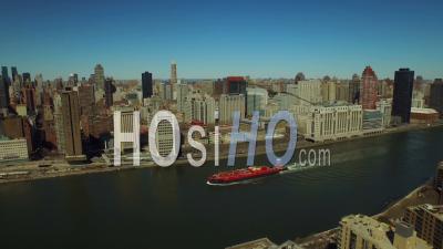 Nyc New York Usa Flying Over Roosevelt Island Panning Left With View Of Midtown East Manhattan Cityscape - Video Drone Footage