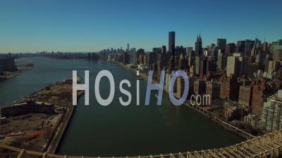 Nyc New York Usa Low Flying Over Queensboro Bridge Panning Right With View Of Midtown East Manhattan Cityscape - Video Drone Footage