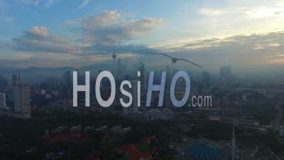Flying Above Kuala Lumpur, Malaysia City Skyline. - Video Drone Footage
