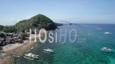Catamarans In Apo Island Tropical Resort Philippines Asia - Video Drone Footage