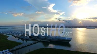 4k Aerial Of Retired Aircraft Carrier Battleship In Charleston South Carolina - Video Drone Footage