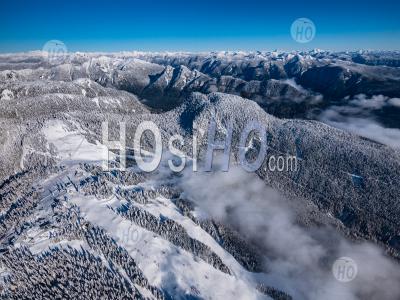 Grouse Mountain And North Shore Mountains In Winter - Aerial Photography