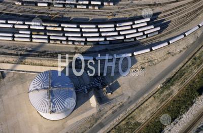 Oil Tank And Trains On Railroad Tracks, Lavera, France. - Aerial Photography