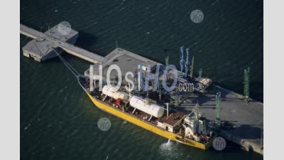 Gas Tanker At Wharf, France. - Aerial Photography
