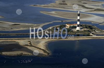 La Gacholle Lighthouse Surrounded With Blue Sea, Camargue, France. - Aerial Photography