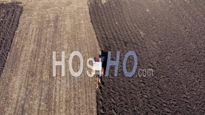Video Drone Footage Of A Tractor In Agricultural Field