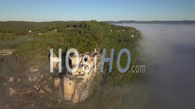 Village Of Castelnaud, Medieval Castle Above The Dordogne Valley - Video Drone Footage At Sunrise, France