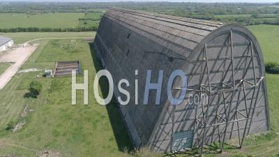 Aerial View Of An Airship Hangar In Ecausseville, Normandy, France - Video Drone Footage