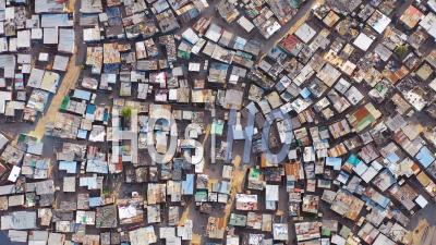 Straight Down Lowering High Aerial View Above Ramshackle Township Of Gugulethu, One Of The Poverty Stricken Slums, Ghetto, Or Townships Of South Africa - Video Drone Footage