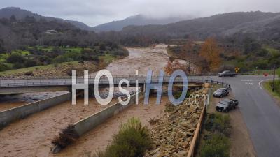 Aerial View Of Flood Waters Moving Fast Down The Ventura River In California With Runoff During Winter Weather Flooding - Vidéo Drone