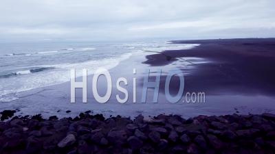 Aerial View Over A Black Sand Beach In Southern Iceland - Video Drone Footage