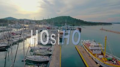 Aerial View Of A Dock With Fishing Boats And Yachts In Croatia - Video Drone Footage