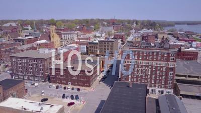 Aerial View Over Small Town America Burlington Iowa Downtown With Mississippi River Background - Video Drone Footage