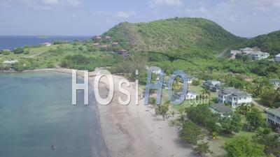 Aerial View Over The Shores And Beaches Of Nevis, An Island In The Caribbean - Video Drone Footage