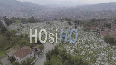 Aerial View Of A Large Cemetery With Gravestones Near Sarajevo, Bosnia Following The Devastating Civil War In The Former Yugoslavia - Video Drone Footage