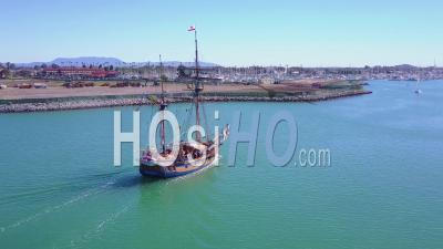 Aerial View Of A Tall Ship Entering Ventura Harbor, California - Video Drone Footage