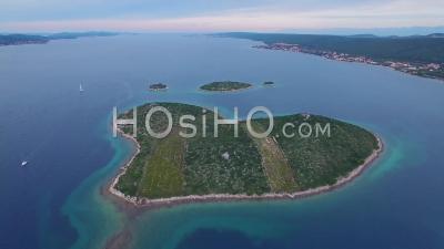 Aerial View Over A Heart Shaped Island In The Adriatic Sea Off Croatia - Video Drone Footage