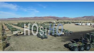 Aerial View Over A Military Vehicle Storage Depot - Video Drone Footage