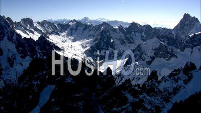 Slow Flight Over Sharpspined Ridges In The French Alps