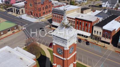 Aerial View Of A Tree Growing Out Of The Top Of A County Courthouse In Greensburg, Indiana - Video Drone Footage