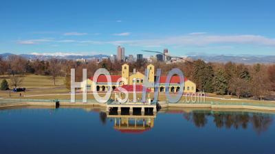 Aerial View Of Downtown Denver Colorado Skyline From Large Lake At City Park - Video Drone Footage