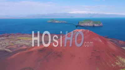 Aerial View Of Eldfell Volcano Looming Over Heimaey In The Westman Islands, Vestmannaeyjar, Iceland - Video Drone Footage