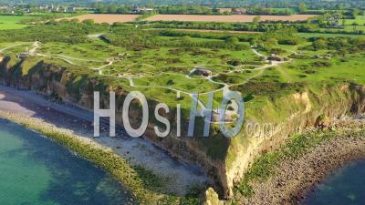 Aerial View Over Pointe Du Hoc, Normandy, France D-Day Site Pockmarked With Bomb Craters - Video Drone Footage