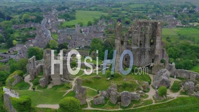 Aerial View Of The Ruins Of Corfe Castle, Dorset, England - Video Drone Footage