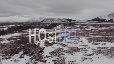 Aerial View Over A Desertic Frozen Landscape. A Troundra Landscape In The Lofoten Islands