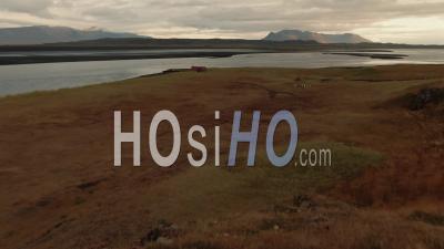 A Fjord And A Black Volcanic Beach In North Iceland - Video Drone Footage