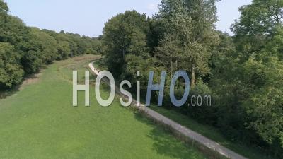 Walkers On A Path In The Countryside Near Coutances - Video Drone Footage