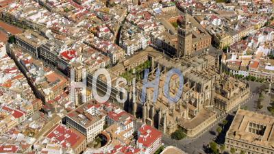 Seville Cathedral With La Giralda Belfry And The Archivos De Las Indias