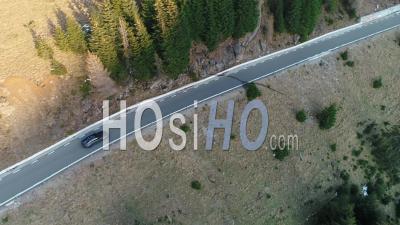 Car Driving On A Mountain Road - Video Drone Footage