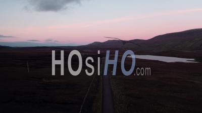 Aerial View Over A838 Across Scottish Highlands At Sunset