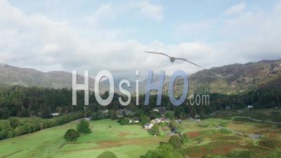 Aerial View Over Scenic Village In Lake District - Video Drone Footage