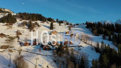 Ski Station And Mountains Lodges In Snow - Video Drone Footage