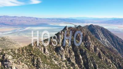 Aerial Video Over Stone Mountaintop Along A Ridge In The Eastern Sierra Mountains Near Lone Pine And The Owens Valley California - Video Drone Footage
