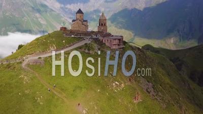 2019 - Aerial Video Of The Gergeti Monastery And Church Overlooking The Caucasus Mountains In The Republic Of Georgia - Video Drone Footage