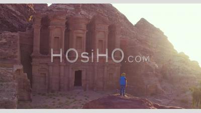 2019 - Aerial Video Of A Man Standing And Looking At The Monastery Building In Petra, Jordan - Video Drone Footage