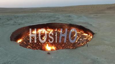 Aerial Video Of The Darvaza Gas Crater Gates Of Hell Fire Pit In Derweze, Turkmenistan - Video Drone Footage