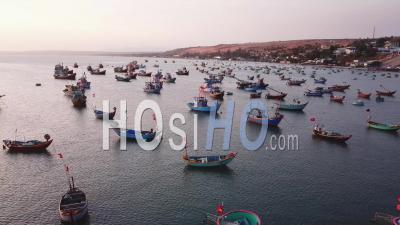 Fisherman Boats Parked In Bay During Sunset - Aerial Video By Drone