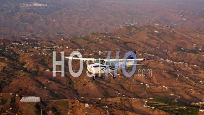 Cessna 172 Flying Over Mountains