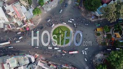 Busy Roundabout During Rush Hour In Ho Chi Minh City, Saigon, Vietnam - Video Drone Footage