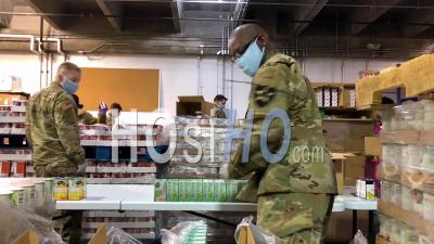 2020 - U.S. Army Soldiers Distribute Food At A Lakewood, Washington Food Bank During The Covid-19 Corona Virus Outbreak Emergency Pandemic Outbreak Food Shortage.