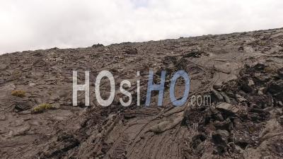 Aerial View Of Dark Volcanic Land, Mauna Loa Volcano, Hawaii - Video Drone Footage