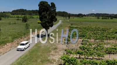 Mini Classic Car On Little Road, Under The Sun, Drone Point Of View