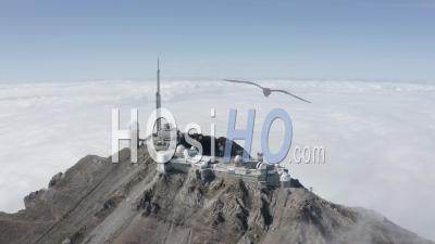 Large Shot Of Pic Du Midi Above Cloud Sea On A Sunny Day Viewed By Drone