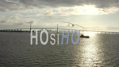 Saint Nazaire Bridge And Big Boat At Sunrise In Loire Atlantique France - Video Drone Footage
