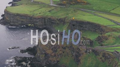 Dunluce Castle On The County Antrim Coast, Northern Ireland. Aerial Drone View